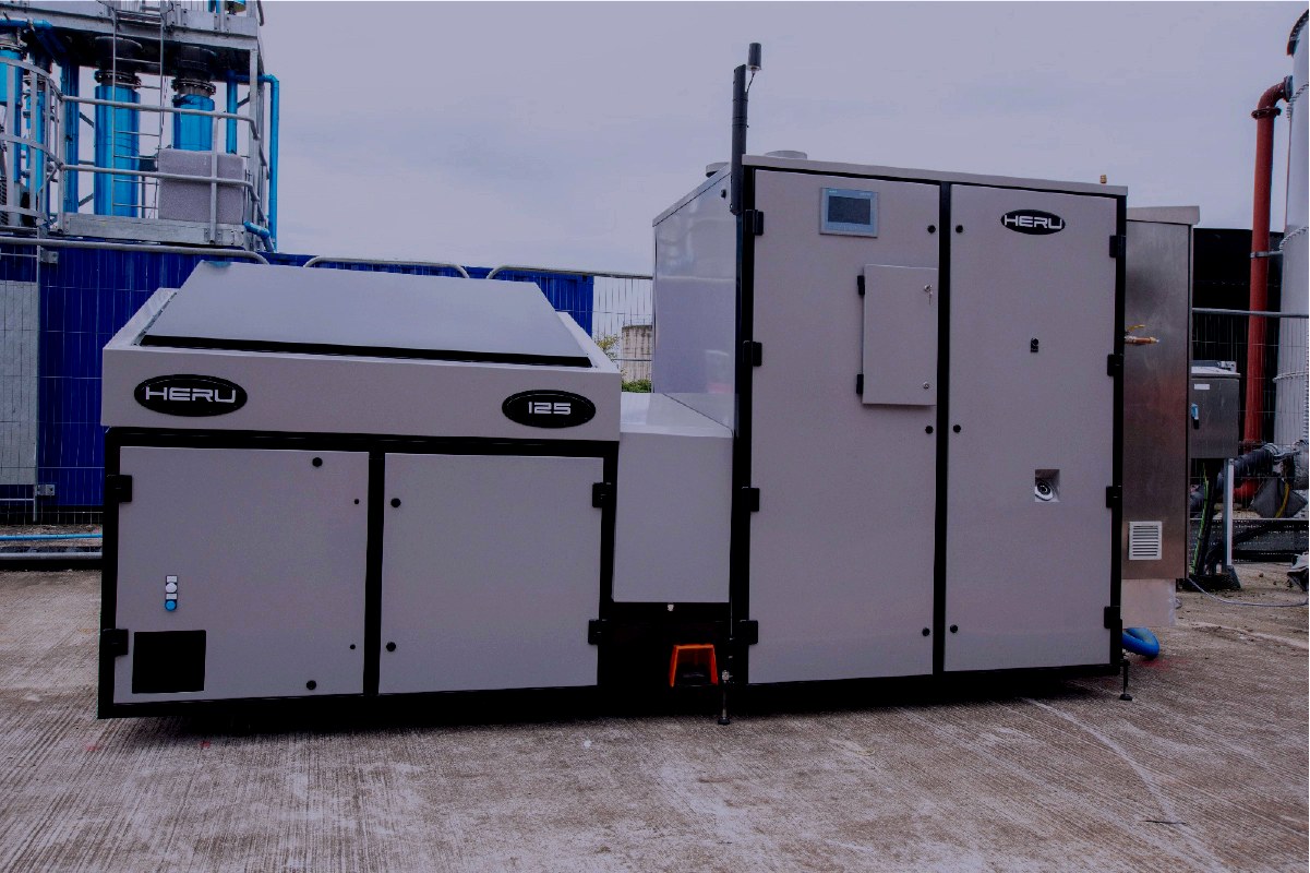 A HERU 125 unit installed on a commercial site alongside existing plant