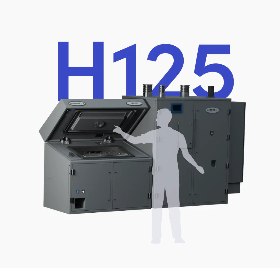 A HERU 125 unit shown alongside a human figure for scale